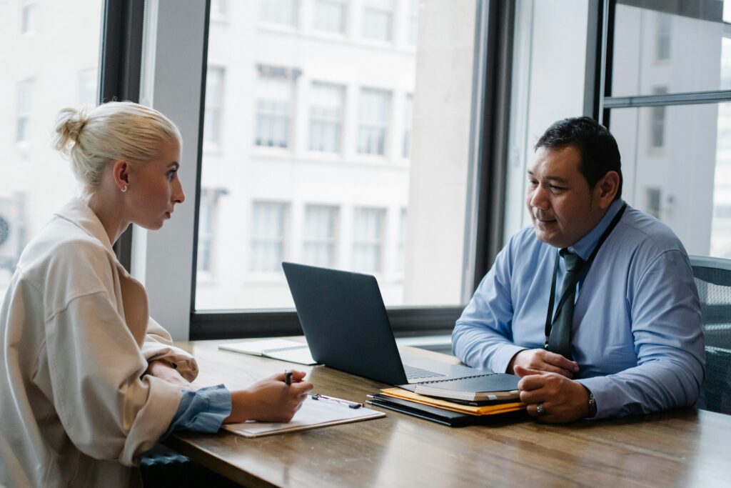 Two people in the middle of a meeting.